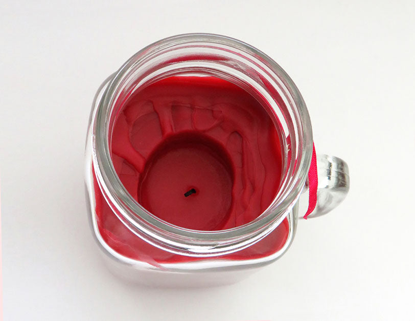 wick tunneled into candle wax