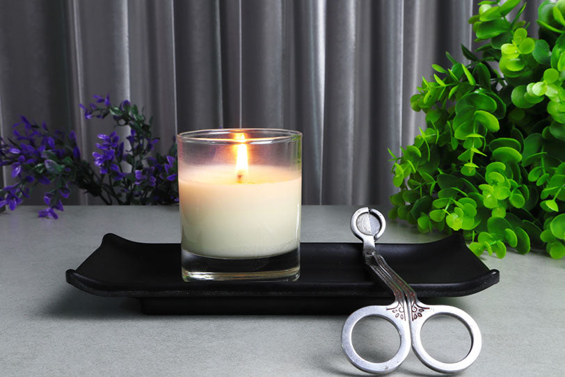 candle with wick trimmers