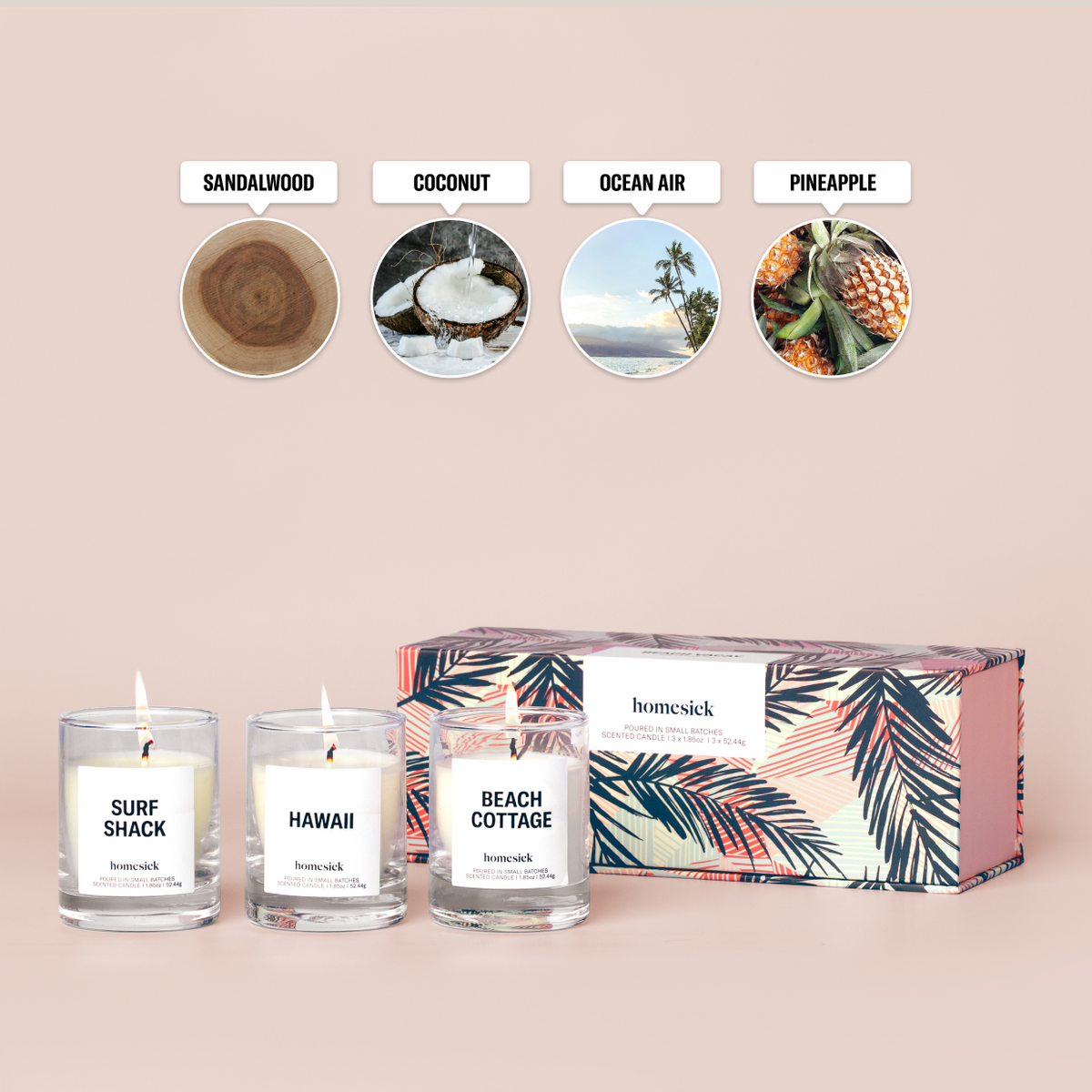 Three mini candles labeled "Beach Cottage", "Hawaii", and "Surf Shack" in front of a box on a cream background with featured scent notes labelled "Sandalwood", "Coconut", "Ocean Air", and "Pineapple"