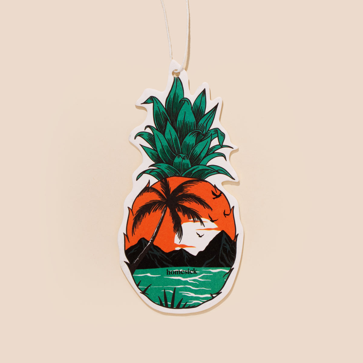 Car freshener on a cream colored background