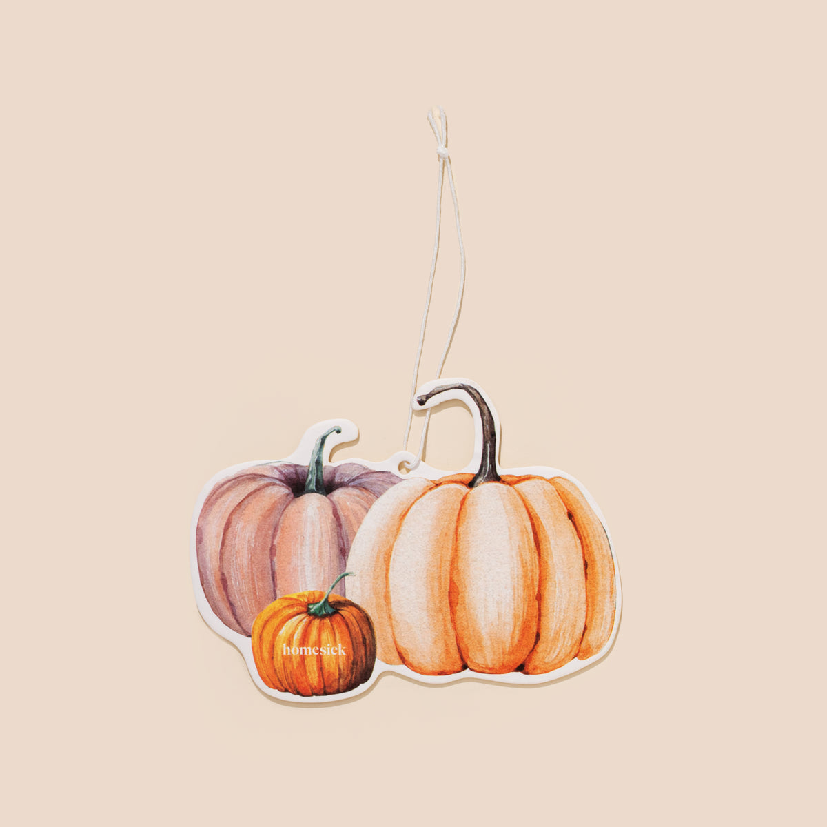 Car freshener on a cream colored background